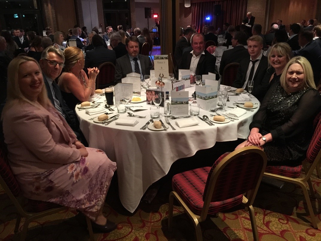 igroup attend charity event for disadvantaged kids